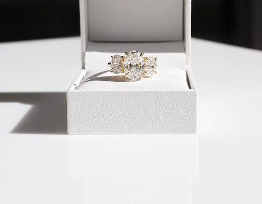 2ct Oval Three Stone Lab Grown Diamond Ring Exquisite diamond-studded gold ring with a modern and elegant design. Luxury gold ring with sparkling diamonds, perfect for weddings or special occasions. YouTube Amazon Facebook Weather Google Gmail Wordless WhatsApp Web Translate News blog post ring ceremony Article Life Money 2025 design Ring Ceremony Diamond Shape Diamond Ring Surat Diamond India Market Diamond Ring for Her Diamond Ring for Men Diamond Ring Women Engagement Ring Finger For Her Finger Ring Gold