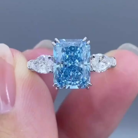 4.50 TCW Fancy Blue Radiant Lab Grown Diamond Engagement Ring | Pear Side Stone Design | IGI Certified