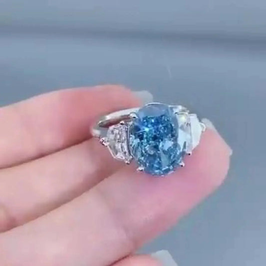 5.00 TCW IGI certified blue oval lab grown diamond ring, three stone bridal engagement ring for women