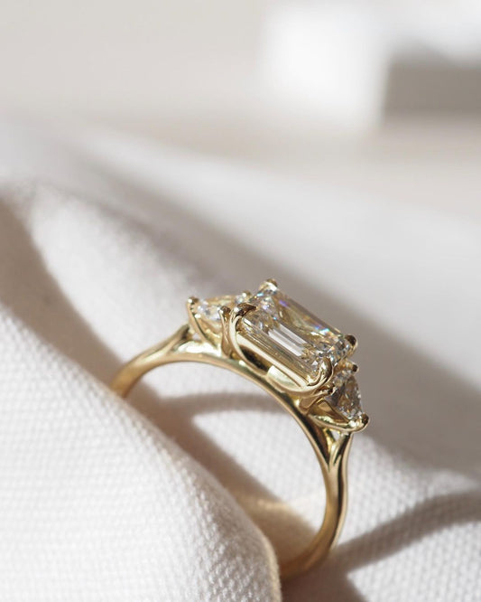 5ct Emerald Center Stone With Two Side Trillion Cut Lab Grown Diamond diamond ring, set on a luxurious gold band, is a timeless piece elegance and sophistication. diamond ring, gold engagement ring, luxury bridal jewelry, wedding accessories, and anniversary diamond ring YouTube Amazon Facebook Weather Google Gmail Wordless WhatsApp Web Translate News blog post ring ceremony Article Life Money 2025 design Ring Ceremony Diamond Shape Diamond Ring Surat Diamond India Market Diamond Ring for Her Diamond Ring