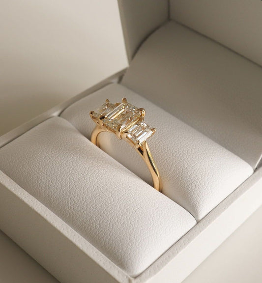 4.5ct Emerald Three Stone Lab Grown Diamond Ring Designed to dazzle, the diamond’s brilliance makes it an ideal choice for engagements, weddings, anniversaries, or any special occasion. YouTube Amazon Facebook Weather Google Gmail Wordless WhatsApp Web Translate News blog post ring ceremony Article Life Money 2025 design Ring Ceremony Diamond Shape Diamond Ring Surat Diamond India Market Diamond Ring for Her Diamond Ring for Men Diamond Ring Women Engagement Ring Finger For Her Finger Ring Gold Ring Blue