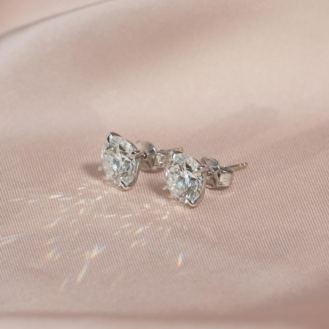 The 4 CTW Stud Earrings set with Round cut diamonds in white gold