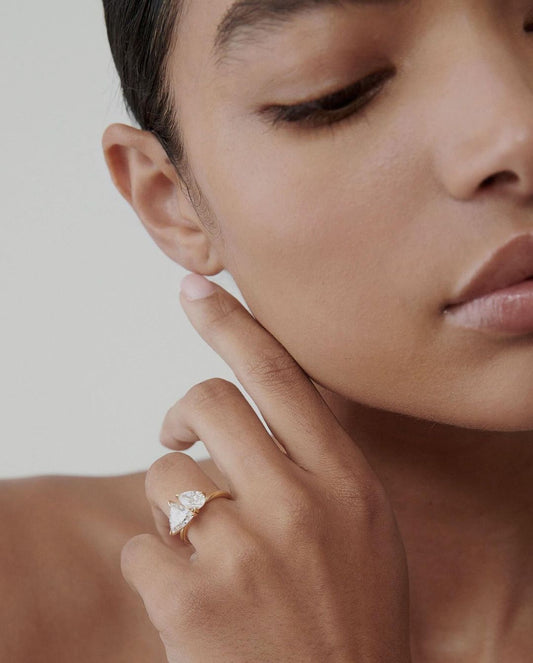 3tcw Pear & Trillion Cut Toi Et Moi Lab Grown Diamond Ring diamond engagement ring with a sleek gold band, featured on a hand with a minimalist manicure. Ideal for bridal jewelry collections, luxury fashion, or romantic proposal moments. YouTube Amazon Facebook Weather Google Gmail Wordless WhatsApp Web Translate News blog post ring ceremony Article Life Money 2025 design Ring Ceremony Diamond Shape Diamond Ring Surat Diamond India Market Diamond Ring for Her Diamond Ring for Men Diamond Ring Women