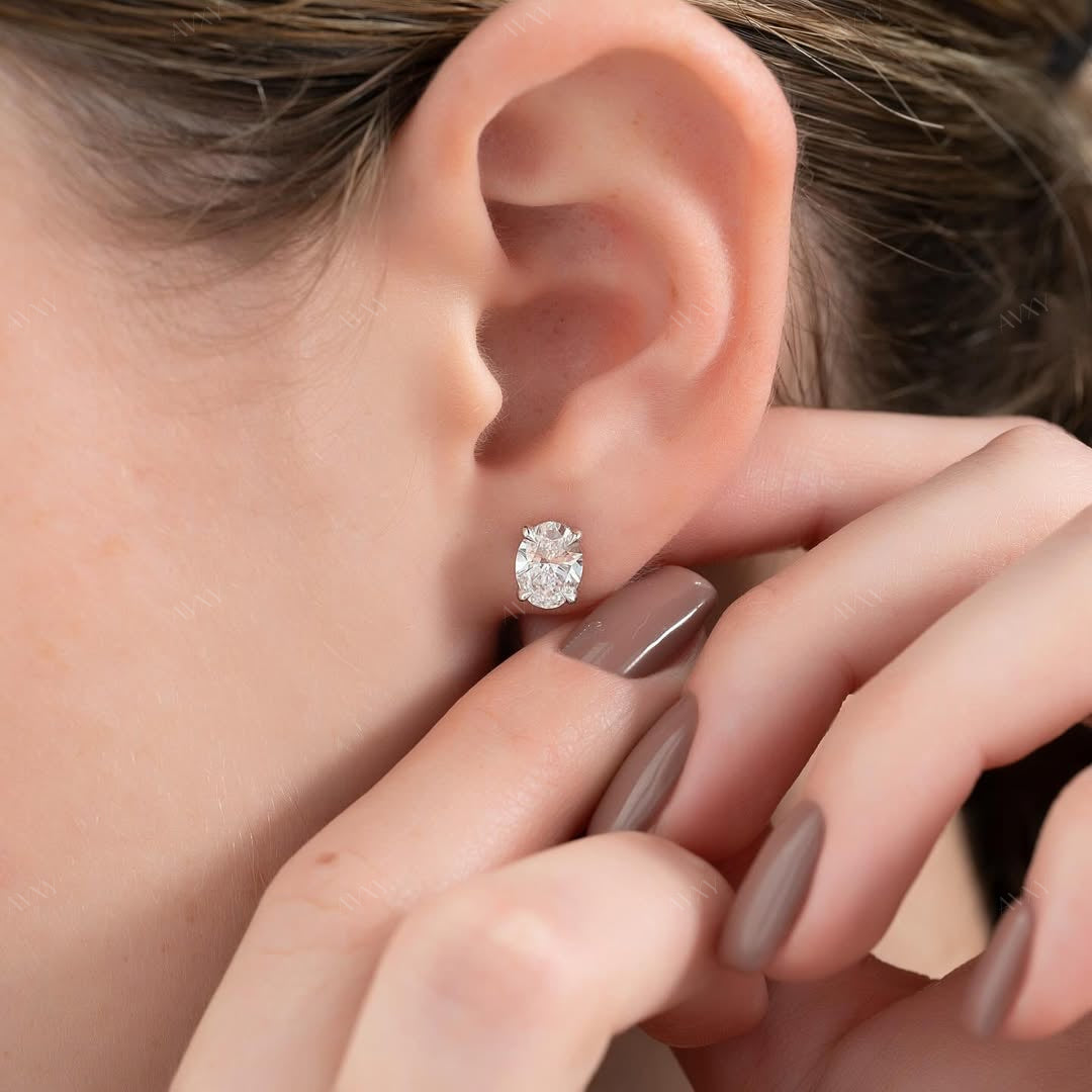 Stud Earrings set with 2 carat Oval cut diamonds in white gold