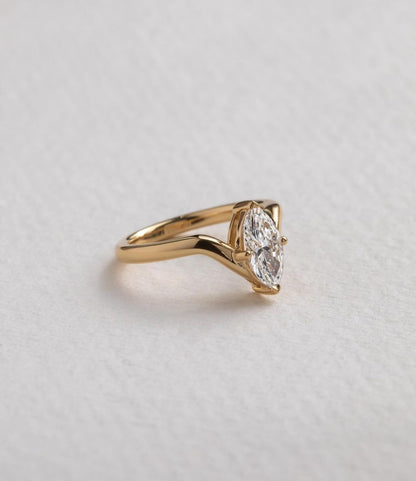 0.90ct Marquise Cut Solitaire Diamond Ring  Classic Minimalist Engagement Ring and wedding gift or promise Gift her/women Delicate gold band featuring princess-cut diamonds, designed for refined elegance. Statement gold ring with a radiant diamond centerpiece, ideal for a bold look. YouTube Amazon Facebook Weather Google Gmail Wordless WhatsApp Web Translate News blog post ring ceremony Article Life Money 2025 design Ring Ceremony Diamond Shape Diamond Ring Surat Diamond India Market Diamond Ring for Her 