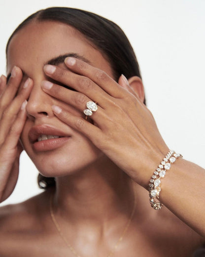 1.5ct Duet Oval Full Bezel Diamond Ring Toi et Moi Close-up of a hand adorned with a sparkling  diamond ring on a sleek gold band, featuring a modern and elegant design. The ring is perfect for engagement, wedding, or luxury jewelry collections. YouTube Amazon Facebook Weather Google Gmail Wordless WhatsApp Web Translate News blog post ring ceremony Article Life Money 2025 design Ring Ceremony Diamond Shape Diamond Ring Surat Diamond India Market Diamond Ring for Her Diamond Ring for Men Diamond Ring Women 