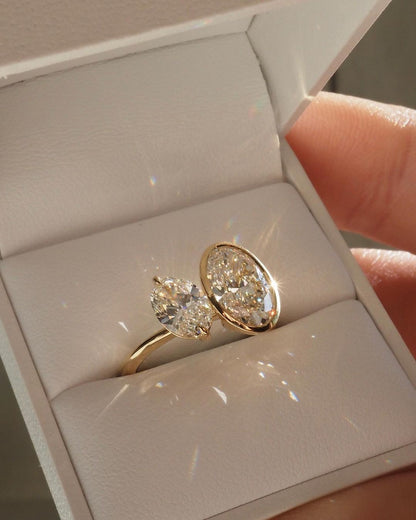 1.5ct Duet Oval Full Bezel Diamond Ring Toi et Moi  Classic  diamond solitaire on a sleek gold band, highlighted on a manicured hand, perfect for wedding and engagement themes. diamond ring, gold engagement ring, luxury bridal jewelry, wedding accessories YouTube Amazon Facebook Weather Google Gmail Wordless WhatsApp Web Translate News blog post ring ceremony Article Life Money 2025 design Ring Ceremony Diamond Shape Diamond Ring Surat Diamond India Market Diamond Ring for Her Diamond Ring for Men 