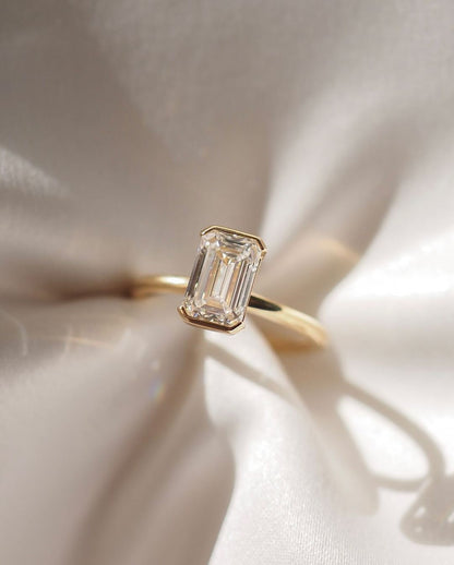 10ct Emerald Half Bezel Cut Solitaire Lab Grown Diamond Ring  timeless elegance of our diamond gold jewelry ring, a perfect blend of luxury and sophistication. Stylish gold ring featuring radiant diamonds, ideal for engagements and celebrations. YouTube Amazon Facebook Weather Google Gmail Wordless WhatsApp Web Translate News blog post ring ceremony Article Life Money 2025 design Ring Ceremony Diamond Shape Diamond Ring 