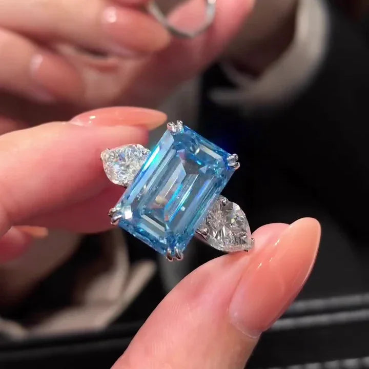 Fancy blue emerald cut lab grown diamond ring with three stone setting, IGI certified engagement jewelry, elegant bridal ring for women