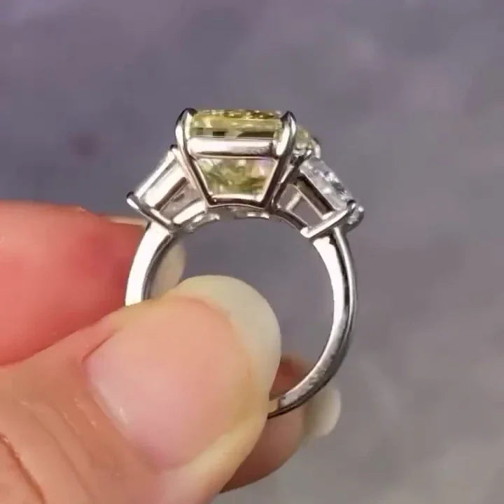 Fancy yellow radiant lab created diamond engagement ring, three stone setting, trapezoid side stones, IGI certified luxury bridal jewelry