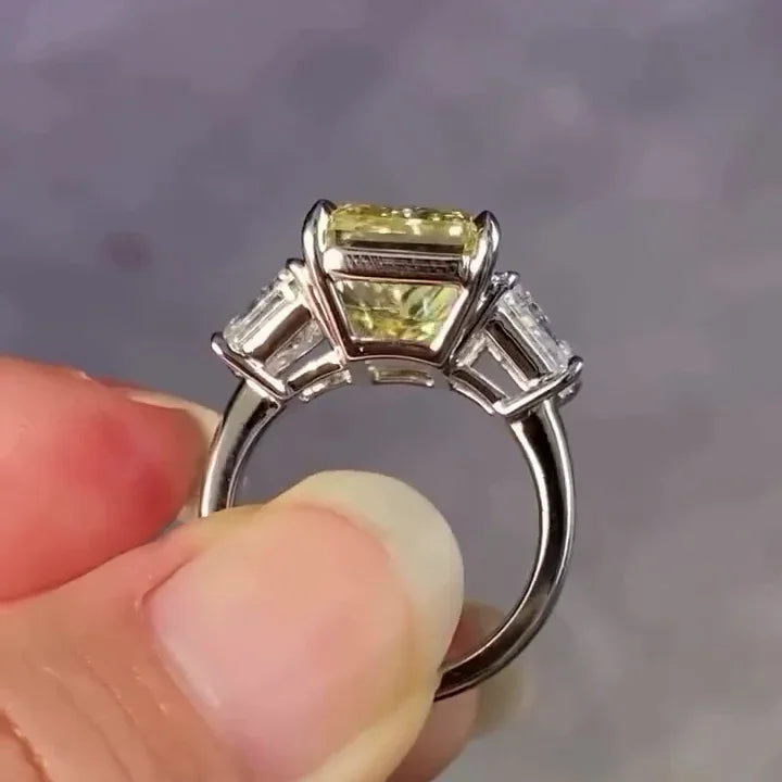 12.50TCW Fancy Yellow Radiant Lab Grown Diamond Engagement Ring | Three Stone Setting with 2.5ct Trapezoid Side Stones | IGI Certified 