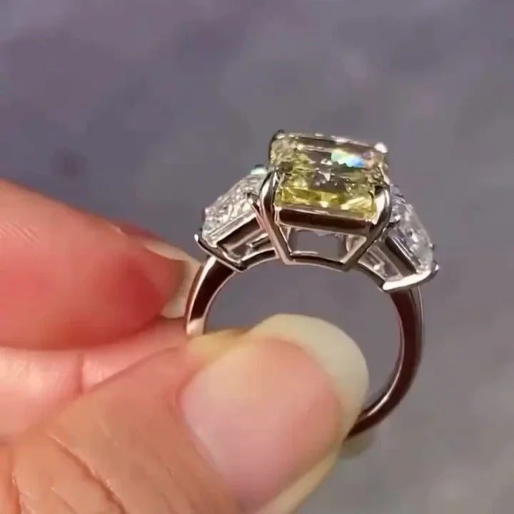 12.50TCW Fancy Yellow Radiant Lab Grown Diamond Engagement Ring | Three Stone Setting with 2.5ct Trapezoid Side Stones | IGI Certified 