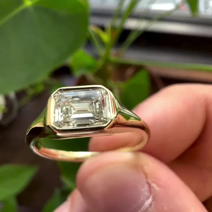 IGI certified emerald cut lab grown diamond ring, bezel setting engagement ring, modern solitaire jewelry, eco friendly bridal ring, fine luxury Emerald lab grown diamond engagement ring with sleek bezel setting, timeless bridal jewelry, proposal ring luxury