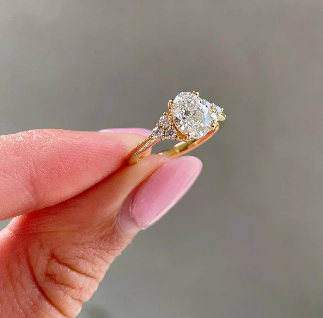 Elegant oval lab grown diamond engagement ring with 1.00ct center, sparkling side stones, 1.00 CT IGI certified bridal ring