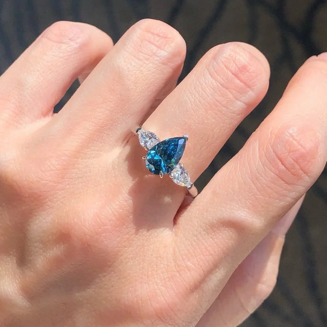 Fancy blue pear engagement ring, lab grown diamond, 3 stone bridal ring, IGI certified diamond, white pear accents, luxury jewelry