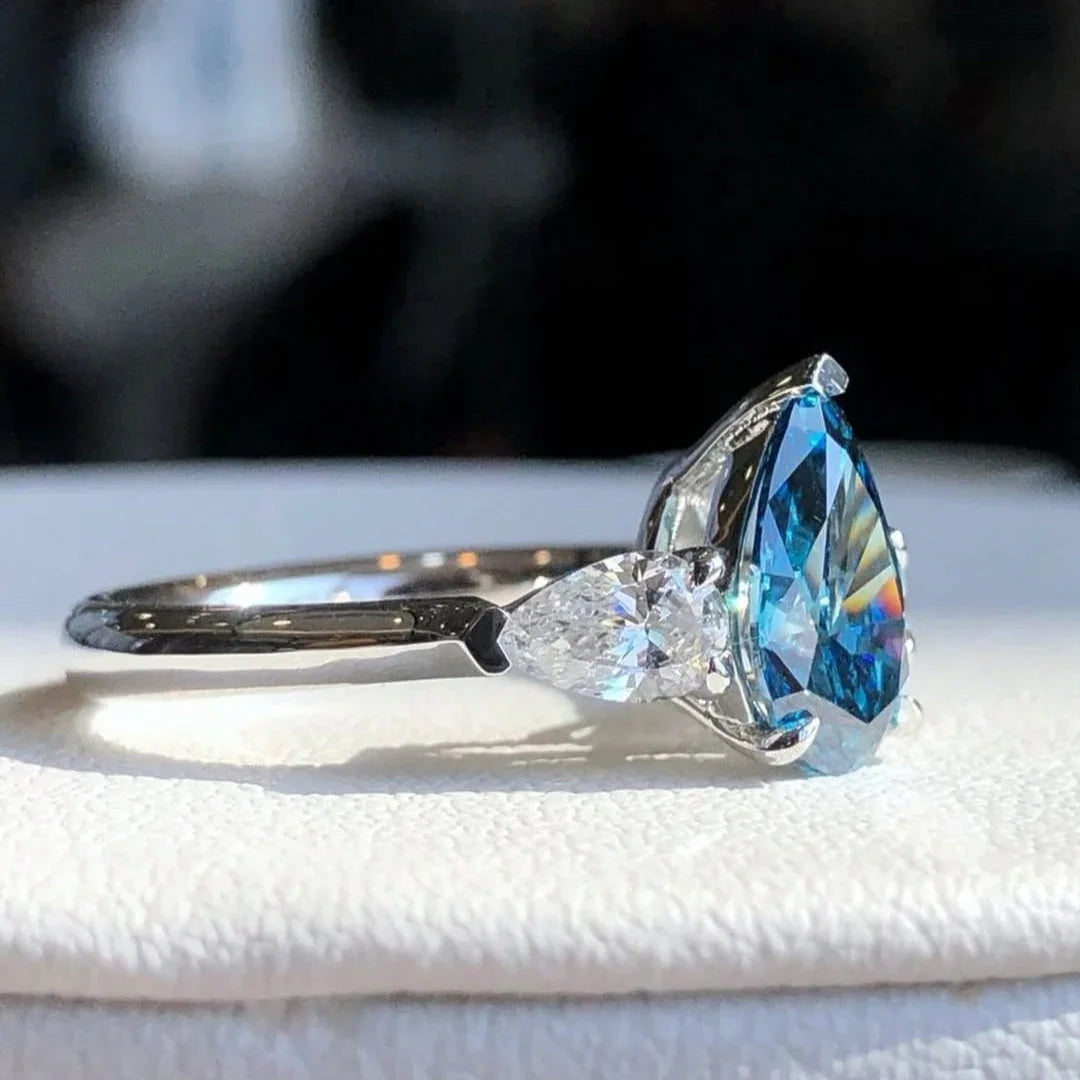 1.50 CT Fancy Blue Pear Lab Grown Diamond Engagement Ring | 0.50 CT White Pear Side Stones | 3-Stone Ring | IGI Certified 