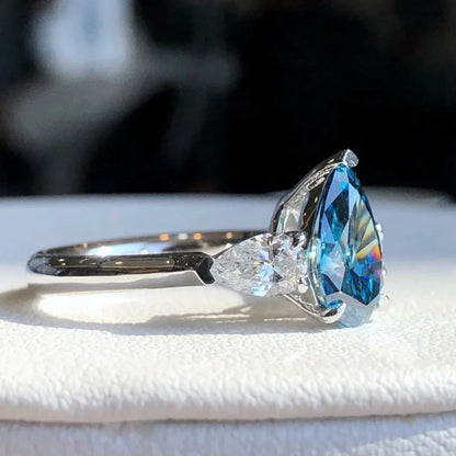 1.50 CT Fancy Blue Pear Lab Grown Diamond Engagement Ring | 0.50 CT White Pear Side Stones | 3-Stone Ring | IGI Certified 