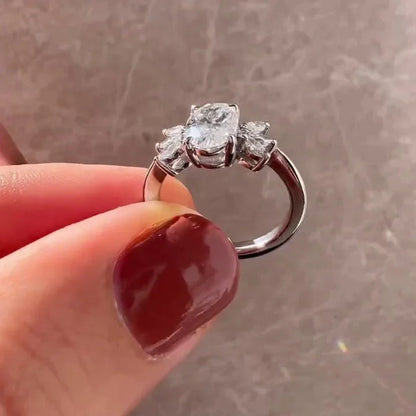 3.0ct oval cut lab grown diamond ring marquise side stones IGI certified engagement ring wedding ring luxury bridal jewelry elegant classic style