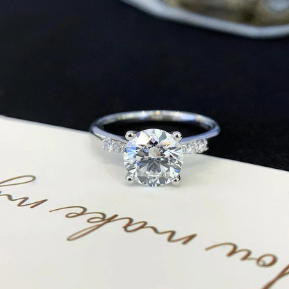 IGI certified round lab grown diamond ring, pavé solitaire engagement ring, elegant bridal jewelry, modern wedding ring for women
