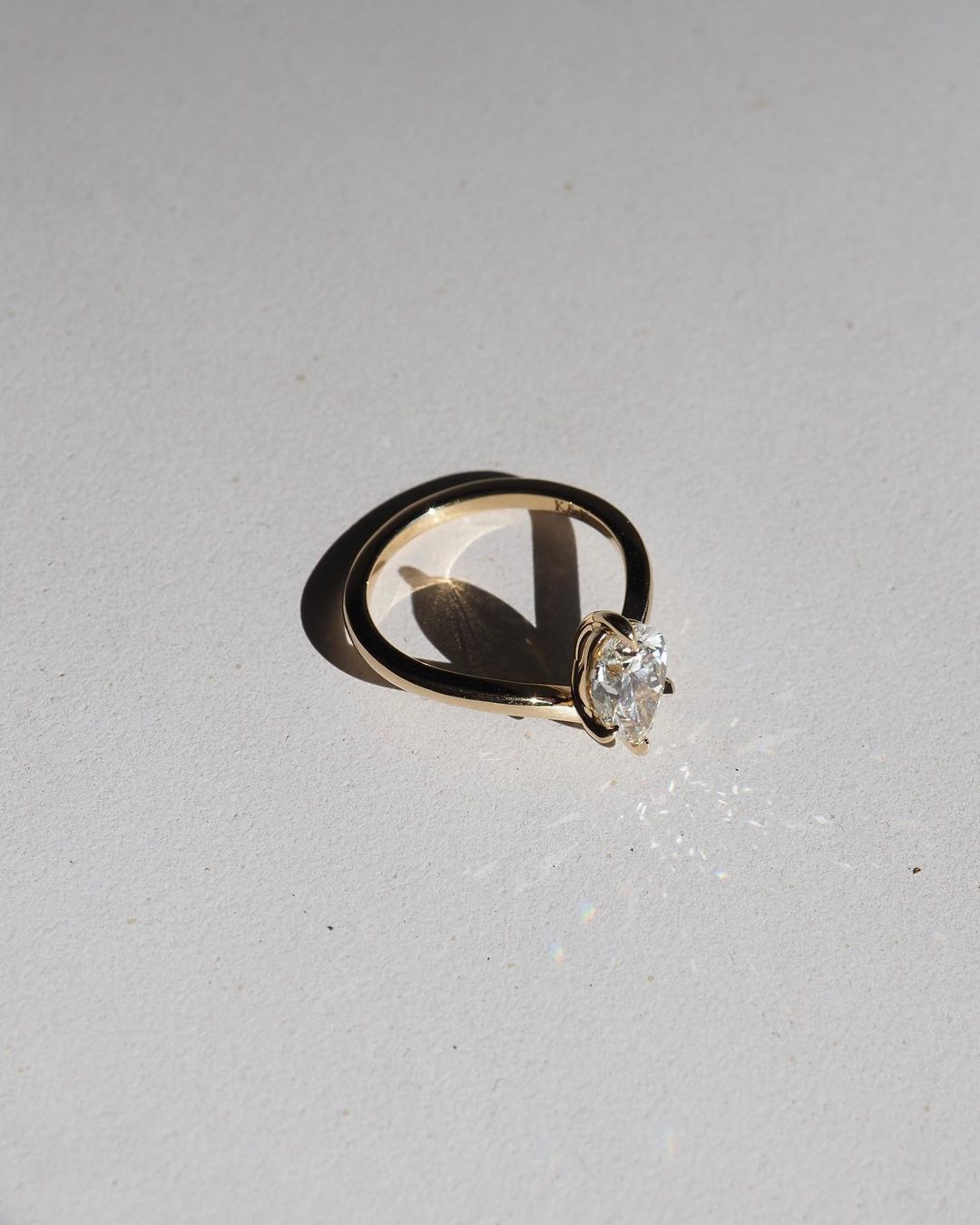 1ct Floating Pear Cut Lab Grown  •  Classic  diamond solitaire on a sleek gold band, highlighted on a manicured hand, perfect for wedding and engagement themes. diamond ring, gold engagement ring, luxury bridal jewelry, wedding accessories YouTube Amazon Facebook Weather Google Gmail Wordless WhatsApp Web Translate News blog post ring ceremony Article Life Money 2025 design Ring Ceremony Diamond Shape Diamond Ring Surat Diamond India Market Diamond Ring for Her Diamond Ring for Men Diamond Ring Women 