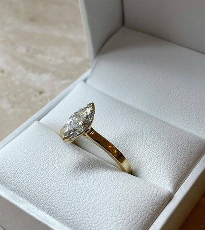 1ct Marquise Solitaire Lab Grown Diamond Ring The sleek gold band complements the brilliance of the diamond, creating a harmonious balance of luxury and sophistication. This ring isn't just for engagements Ring, proposals, weddings, or premium jewelry collections. YouTube Amazon Facebook Weather Google Gmail Wordless WhatsApp Web Translate News blog post ring ceremony Article Life Money 2025 design Ring Ceremony Diamond Shape Diamond Ring Surat Diamond India Market Diamond Ring for Her Diamond Ring for Men 
