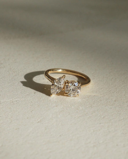 1ct Round And Marquise Toi Et Moi Cut Diamond Ring Close-up of a hand adorned with a sparkling  diamond ring on a sleek gold band, featuring a modern and elegant design. The ring is perfect for engagement, wedding, or luxury jewelry collections YouTube Amazon Facebook Weather Google Gmail Wordless WhatsApp Web Translate News blog post ring ceremony Article Life Money 2025 design Ring Ceremony Diamond Shape Diamond Ring Surat Diamond India Market Diamond Ring for Her Diamond Ring for Men Diamond Ring Women 