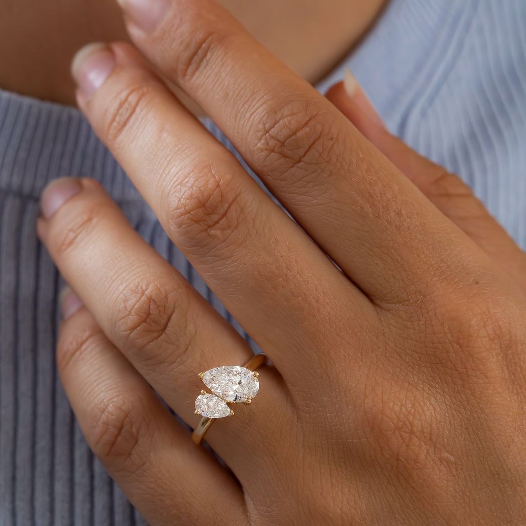 2.5ct Duet Pear Cut Lab Grown Diamond Ring This diamond ring Whether you're planning a proposal, celebrating an anniversary, or looking for the ideal wedding band, this exquisite piece of jewelry will stand out. YouTube Amazon Facebook Weather Google Gmail Wordless WhatsApp Web Translate News blog post ring ceremony Article Life Money 2025 design Ring Ceremony Diamond Shape Diamond Ring Surat Diamond India Market Diamond Ring for Her Diamond Ring for Men Diamond Ring Women Engagement Ring Finger For Her 