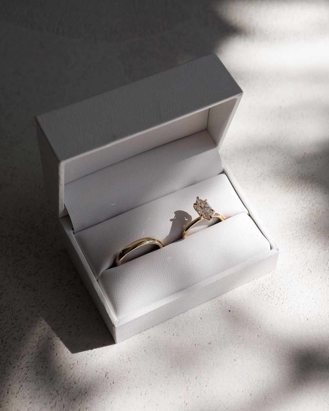 2.5ct Marquise Lab Grown Diamond Orbit Ring Close-up of an exquisite gold-band ring featuring a diamond, ideal for engagement celebrations or luxury jewelry enthusiasts. The soft manicure enhances the refined and elegant appeal. YouTube Amazon Facebook Weather Google Gmail Wordless WhatsApp Web Translate News blog post ring ceremony Article Life Money 2025 design Ring Ceremony Diamond Shape Diamond Ring Surat Diamond India Market Diamond Ring for Her Diamond Ring for Men Diamond Ring Women Engagement Ring 