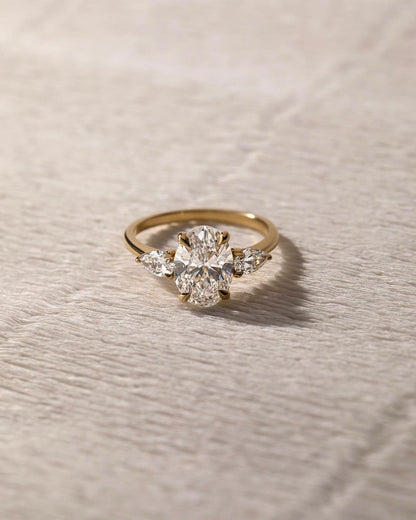 2.5ct Oval Cut Center Stone With Two side Pear Cut Luxury Diamond Ring on a Sleek Gold Band – Perfect for Engagements, Weddings, and Special Occasions  YouTube Amazon Facebook Weather Google Gmail Wordless WhatsApp Web Translate News blog post ring ceremony Article Life Money 2025 design Ring Ceremony Diamond Shape Diamond Ring Surat Diamond India Market Diamond Ring for Her Diamond Ring for Men Diamond Ring Women Engagement Ring Finger For Her Finger Ring Gold Ring Bluestone Ring Diamond Ring Price Gold 