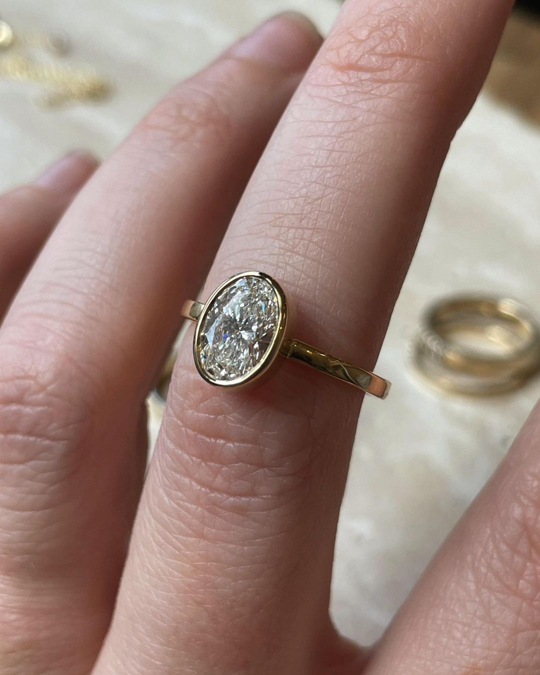 2.5ct Oval Cut Full Bezel Lab Grown Diamond Ring Showcasing the beauty of making it perfect for bridal shoots, or jewelry promotions. Diamond engagement ring, bridal jewelry, luxury fashion, proposal moments, gold band. YouTube Amazon Facebook Weather Google Gmail Wordless WhatsApp Web Translate News blog post ring ceremony Article Life Money 2025 design Ring Ceremony Diamond Shape Diamond Ring Surat Diamond India Market Diamond Ring for Her Diamond Ring for Men Diamond Ring Women Engagement Ring Finger For