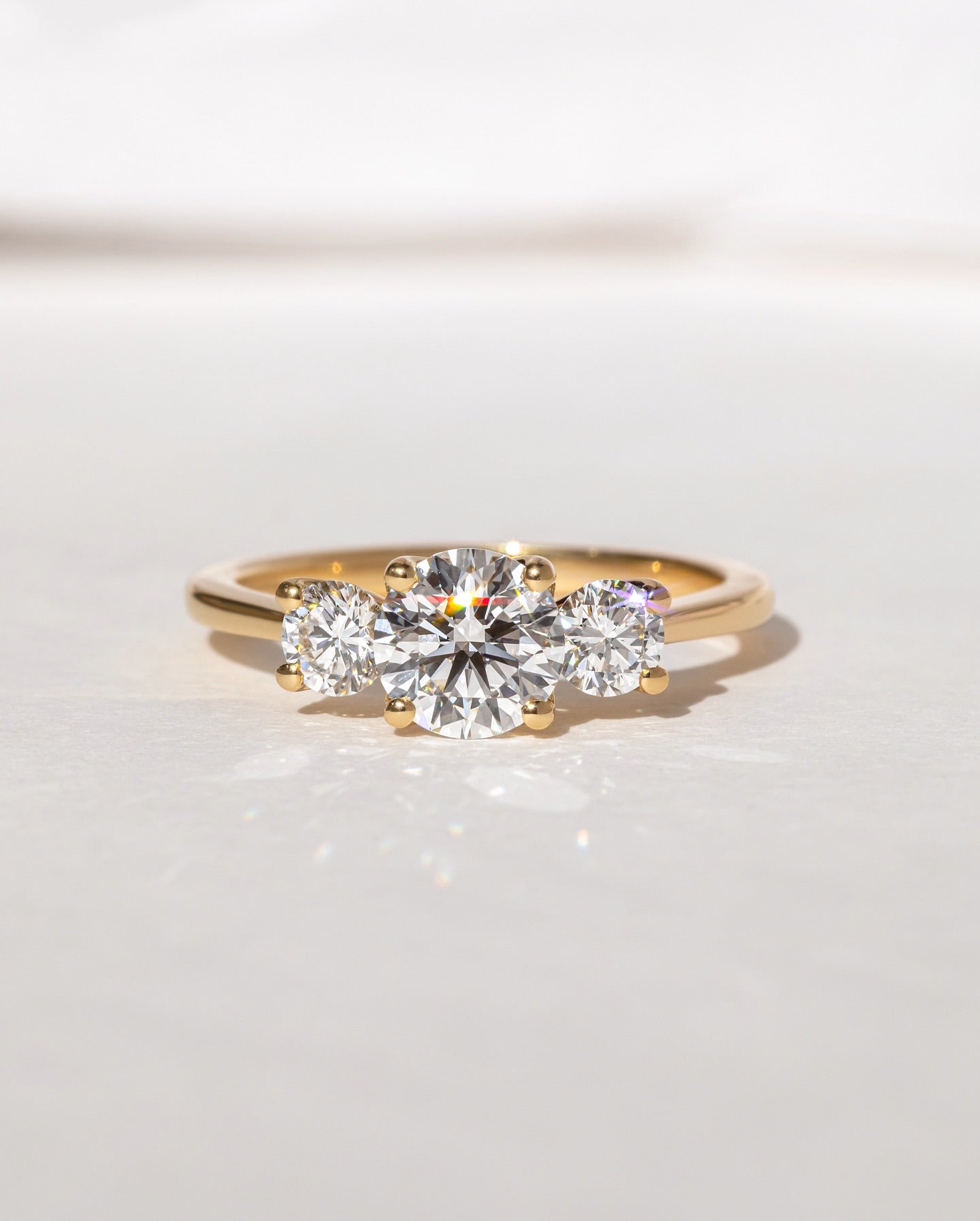 2.5ct Round Cut Three Stone Lab Grown Diamond Ring Minimalist gold band with a single brilliant diamond, designed for understated elegance. Artisan-crafted gold ring with geometric diamond settings for a contemporary touch. YouTube Amazon Facebook Weather Google Gmail Wordless WhatsApp Web Translate News blog post ring ceremony Article Life Money 2025 design Ring Ceremony Diamond Shape Diamond Ring Surat Diamond India Market Diamond Ring for Her Diamond Ring for Men Diamond Ring Women Engagement Ring Finger