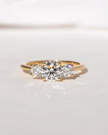 2.5ct Round Cut Three Stone Lab Grown Diamond Ring Minimalist gold band with a single brilliant diamond, designed for understated elegance. Artisan-crafted gold ring with geometric diamond settings for a contemporary touch. YouTube Amazon Facebook Weather Google Gmail Wordless WhatsApp Web Translate News blog post ring ceremony Article Life Money 2025 design Ring Ceremony Diamond Shape Diamond Ring Surat Diamond India Market Diamond Ring for Her Diamond Ring for Men Diamond Ring Women Engagement Ring Finger