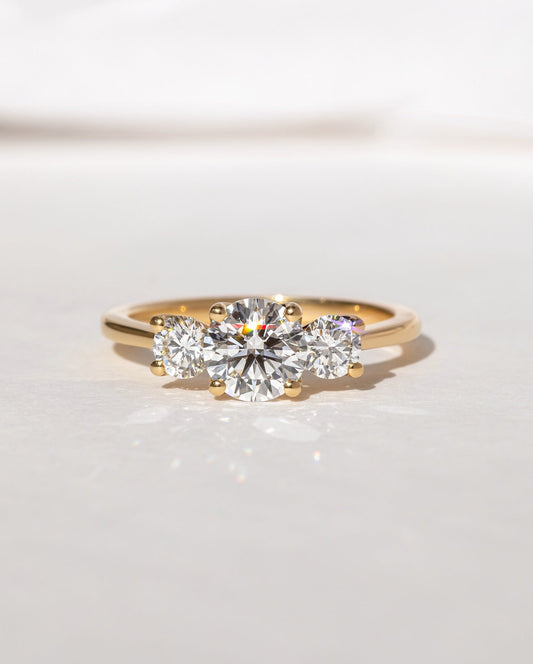 2.5ct Round Cut Three Stone Lab Grown Diamond Ring Minimalist gold band with a single brilliant diamond, designed for understated elegance. Artisan-crafted gold ring with geometric diamond settings for a contemporary touch. YouTube Amazon Facebook Weather Google Gmail Wordless WhatsApp Web Translate News blog post ring ceremony Article Life Money 2025 design Ring Ceremony Diamond Shape Diamond Ring Surat Diamond India Market Diamond Ring for Her Diamond Ring for Men Diamond Ring Women Engagement Ring Finger