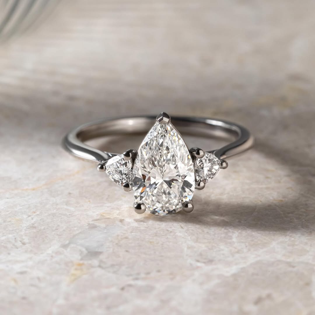 2.5ct Trio Lab Grown Diamond Ring  Radiant gold-banded diamond engagement ring with a, displayed on a hand with a chic manicure for bridal and luxury jewelry lovers. modern engagement rings, premium wedding bands, or high-end diamond rings. YouTube Amazon Facebook Weather Google Gmail Wordless WhatsApp Web Translate News blog post ring ceremony Article Life Money 2025 design Ring Ceremony Diamond Shape Diamond Ring Surat Diamond India Market Diamond Ring for Her Diamond Ring for Men Diamond Ring Women 