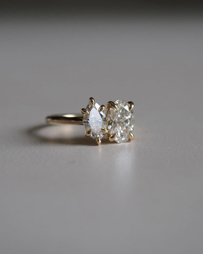 2.5tcw Marquise & Oval Toi Et Moi Lab Grown Diamond Ring The sleek gold band complements the brilliance of the diamond, creating a harmonious balance of luxury and sophistication. This ring isn't just for engagements Ring, proposals, weddings, or premium jewelry collections. YouTube Amazon Facebook Weather Google Gmail Wordless WhatsApp Web Translate News blog post ring ceremony Article Life Money 2025 design Ring Ceremony Diamond Shape Diamond Ring Surat Diamond India Market Diamond Ring for Her Diamond 