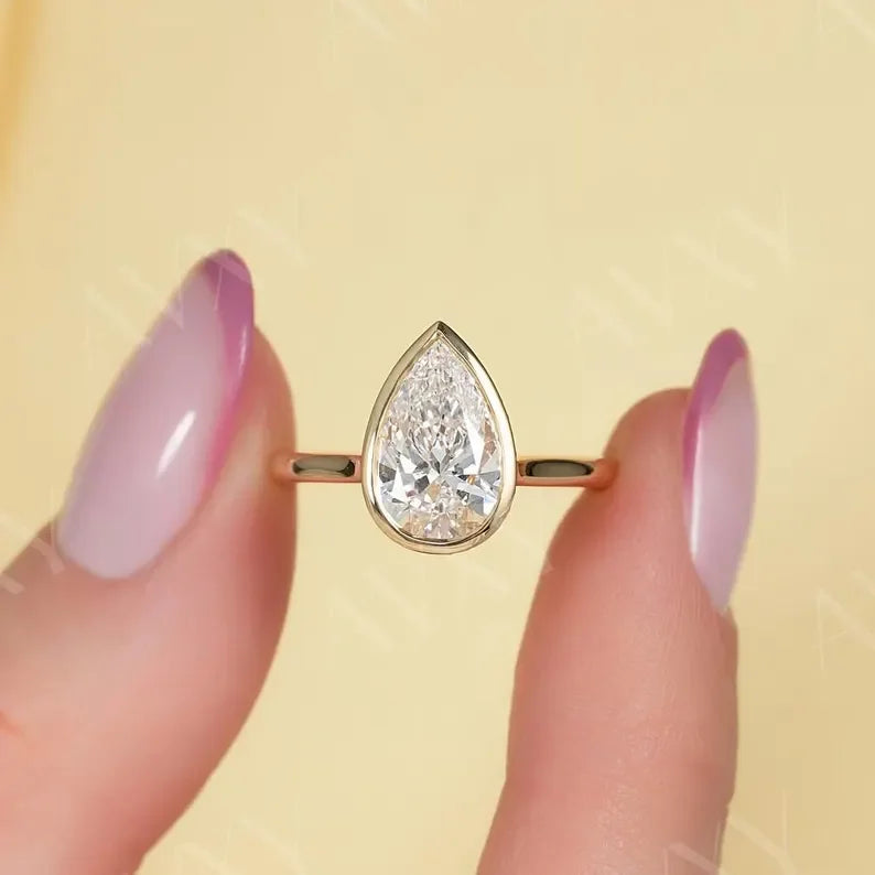 2.00ct pear cut lab grown diamond engagement ring full bezel hidden halo IGI certified bridal ring ethical sustainable luxury proposal fine jewelry solitaire