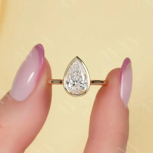 2.00ct pear cut lab grown diamond engagement ring full bezel hidden halo IGI certified bridal ring ethical sustainable luxury proposal fine jewelry solitaire