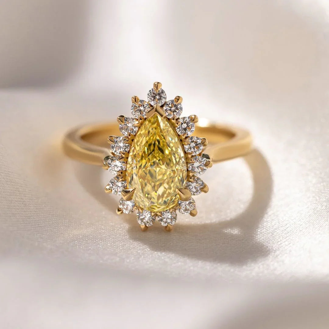 2.0ct fancy yellow pear lab grown diamond engagement ring IGI certified crown setting bridal wedding gold fine jewelry luxury elegant pear cut ring