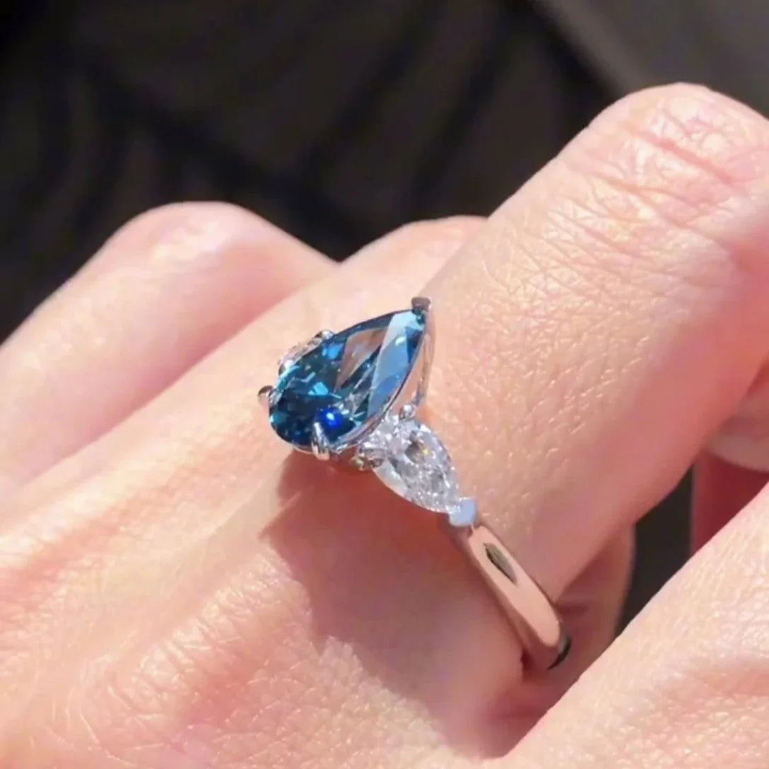 Pear shape fancy blue lab grown diamond engagement ring 2.00 CT, pavé three stone ring, IGI certified luxury wedding ring