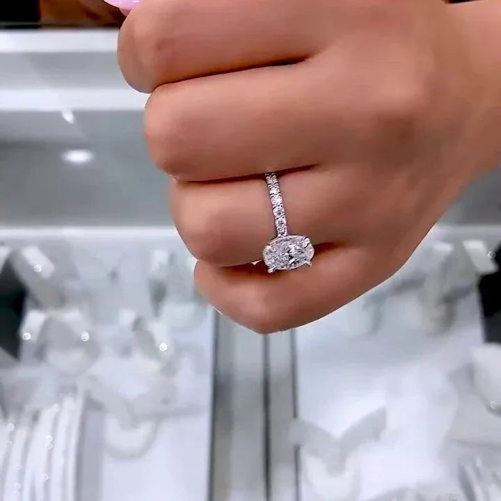 Oval lab grown diamond engagement ring 2.30TCW, hidden halo pavé band setting, IGI certified luxury engagement ring design