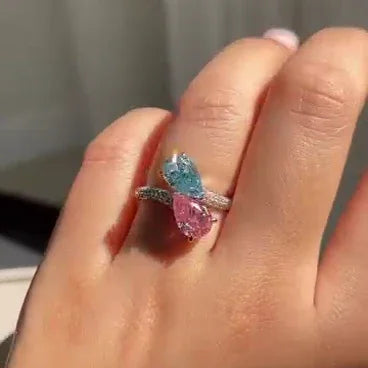 2.50 TCW Fancy Pink & Blue Pear Lab Grown Diamond Engagement Ring | Bypass Style | Pavé Band | IGI Certified 