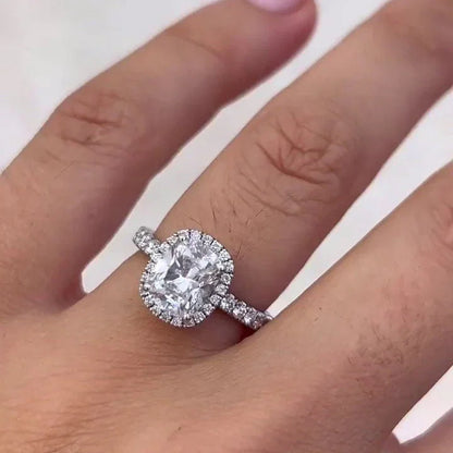 IGI certified 2.6ct cushion lab grown diamond engagement ring halo pavé band setting bridal ring luxury sustainable fine jewelry wedding ring design