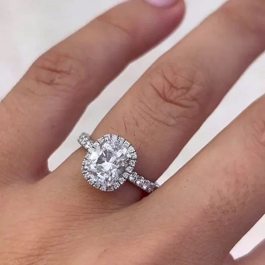 IGI certified 2.6ct cushion lab grown diamond engagement ring halo pavé band setting bridal ring luxury sustainable fine jewelry wedding ring design