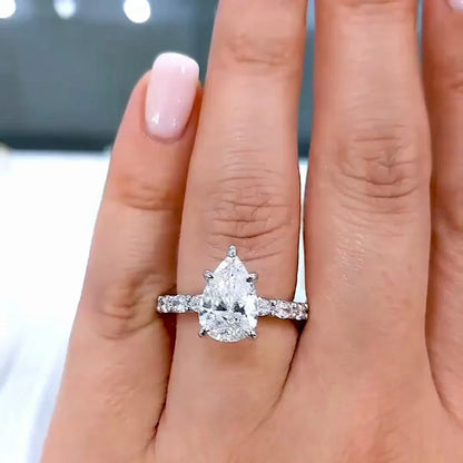 IGI certified 2.50 CT pear lab grown diamond engagement ring accent stone pavé design bridal luxury sustainable fine jewelry wedding ring