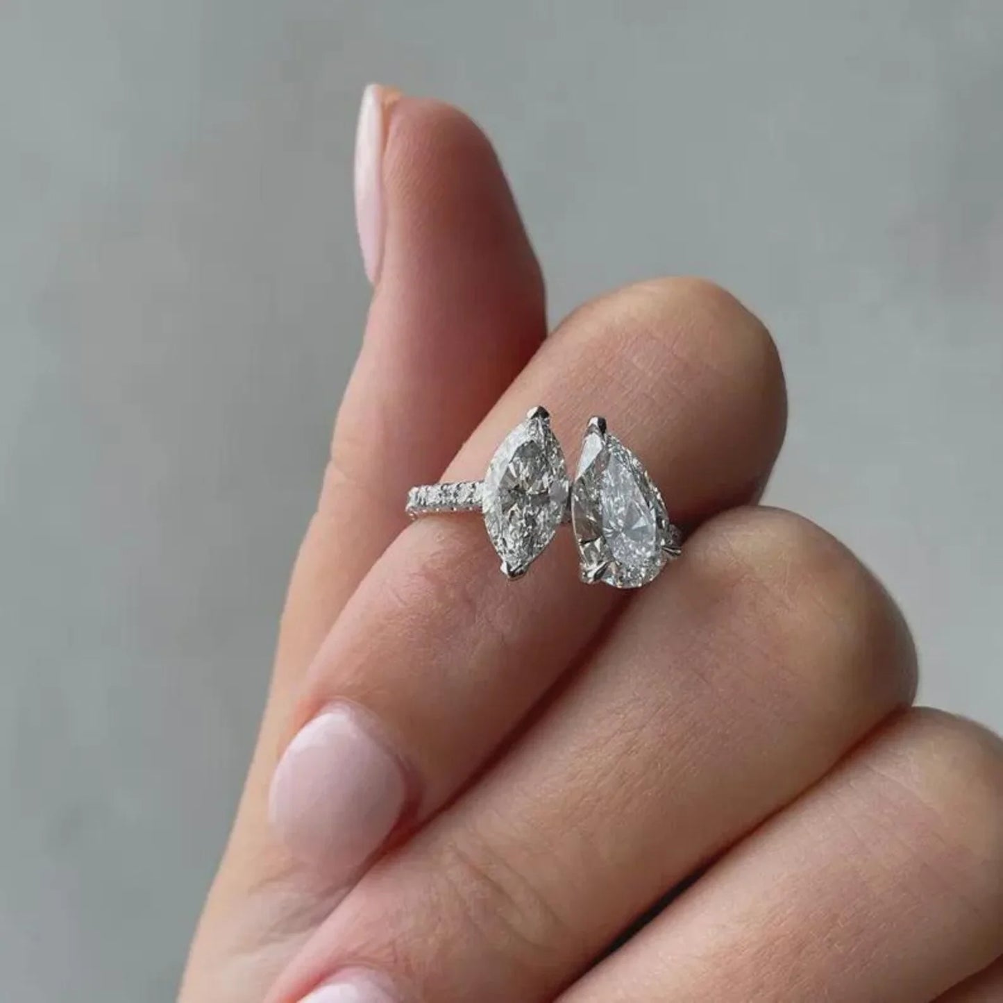IGI certified 2.80 TCW pear and marquise lab grown diamond engagement ring Toi Et Moi bridal luxury sustainable fine jewelry wedding ring