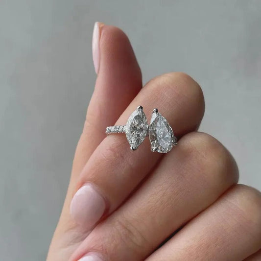 IGI certified 2.80 TCW pear and marquise lab grown diamond engagement ring Toi Et Moi bridal luxury sustainable fine jewelry wedding ring