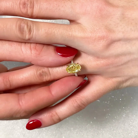 Fancy yellow oval cut lab grown diamond ring 2.90TCW, two-tone hidden halo setting, IGI certified wedding ring for women