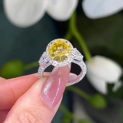 Elegant 2.90TCW fancy yellow oval lab grown diamond ring, two-tone hidden halo setting, IGI certified anniversary jewelry