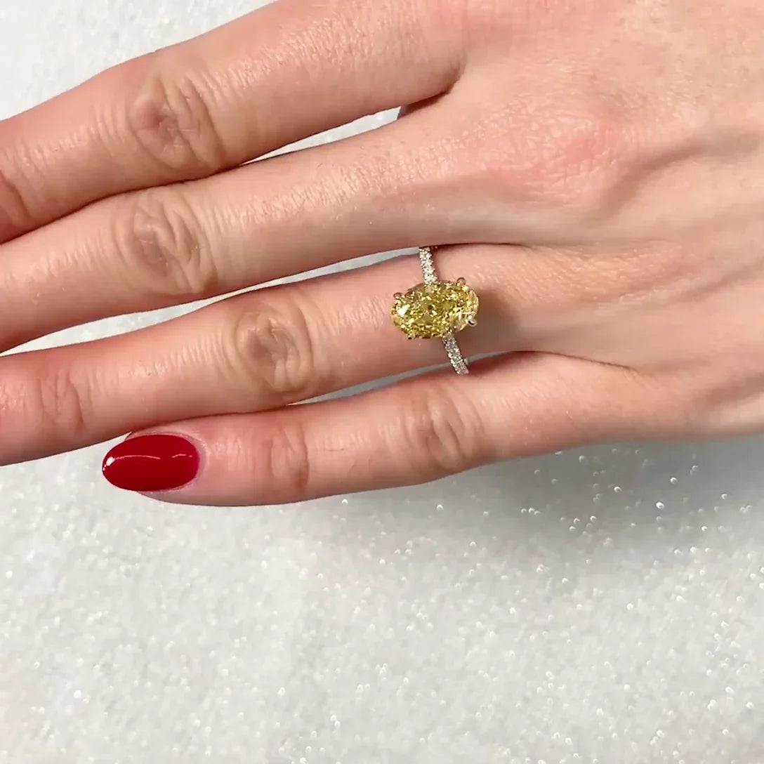 2.90TCW fancy yellow oval lab grown diamond engagement ring with two-tone hidden halo, IGI certified luxury bridal jewelry