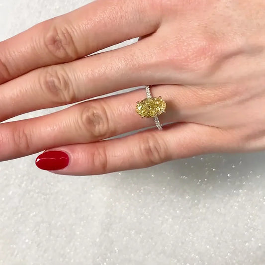 2.90TCW fancy yellow oval lab grown diamond engagement ring with two-tone hidden halo, IGI certified luxury bridal jewelry